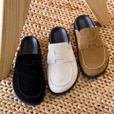 Hermès Go mules in suede calfskin, featuring the iconic "H" cut-out detail, displayed in black, beige sable, and brown color variants.