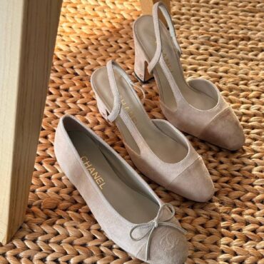 Chanel suede cap-toe ballerina flats and a pair of Chanel suede cap